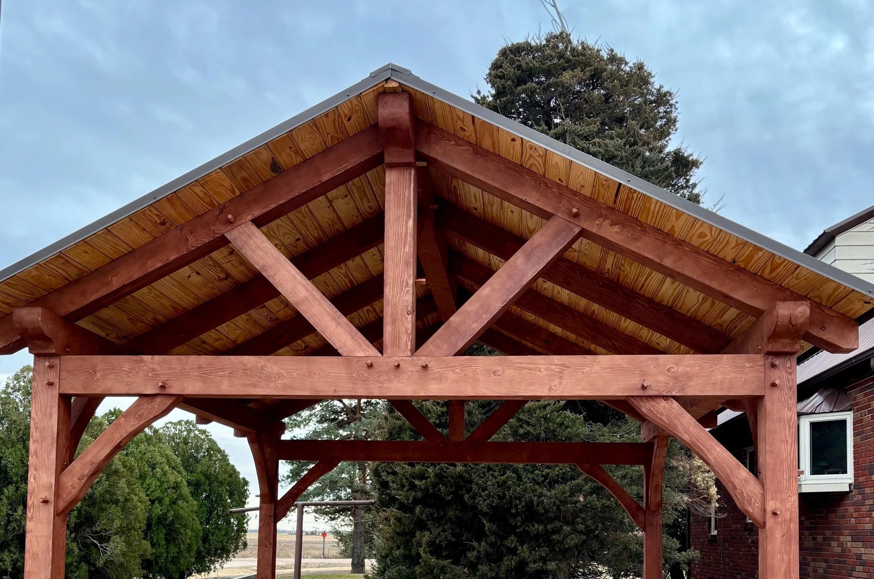 pavilion roof with red stain